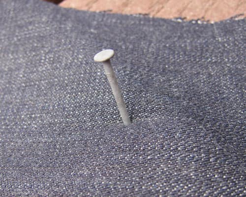 jeans_rivets_pokehole3 Nail through denim
