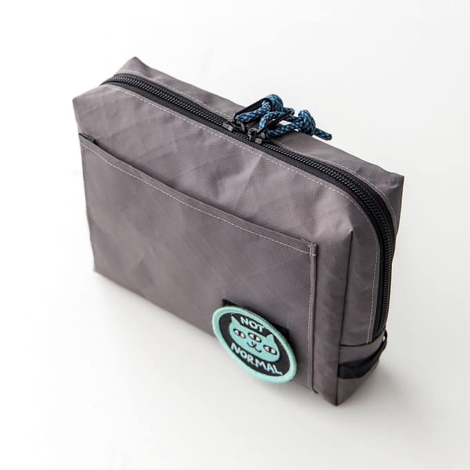 Closed pouch angle 2: "Earl Grey zippered box pouch sewing pattern, side view showing depth